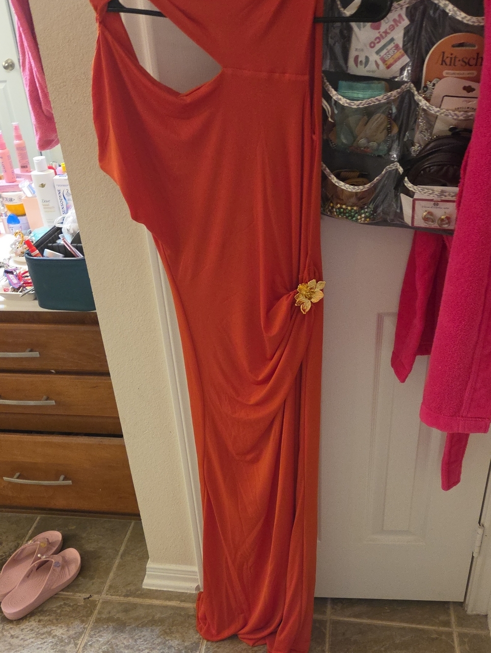 Elegant Orange One-Shoulder Evening Dress with Floral Accent